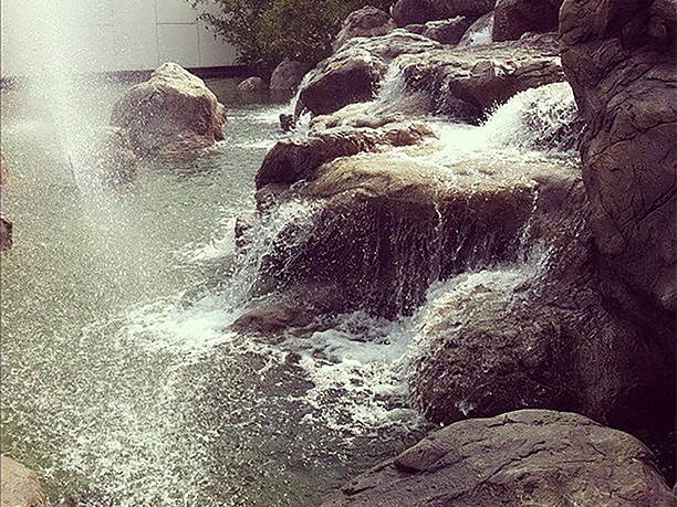 Waterfall and artificial rock at Phothalai Leisure Park Bangkok